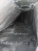 Inside the skirt of The Princess Anne (GH-2007), via the lowered bow ramp, showing the superstructure below